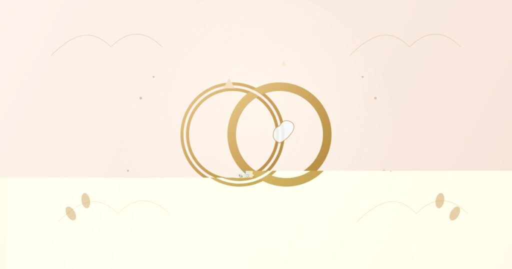 Two interlocking gold wedding rings on a soft blush background